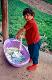 8 Romania 2002 Mountain village, Casa de Piatra, Apuseni, child washing clothes.jpg.jpg