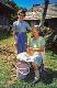 66 Romania 2002 woman husking corn with grandson, Padurea Crailului mountains.jpg.jpg