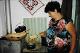 24 Romania 2002 making mamaliga traditional food, measuring maize flour into warm water.jpeg.jpg
